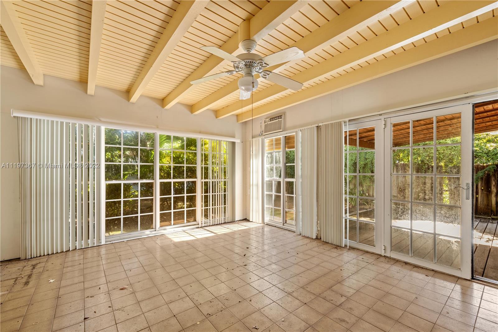 531 Northeast 55th Terrace Miami, FL 33137 - Photo 7 of 22 a view of empty room with windows