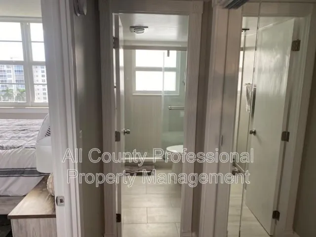 a bathroom with a mirror