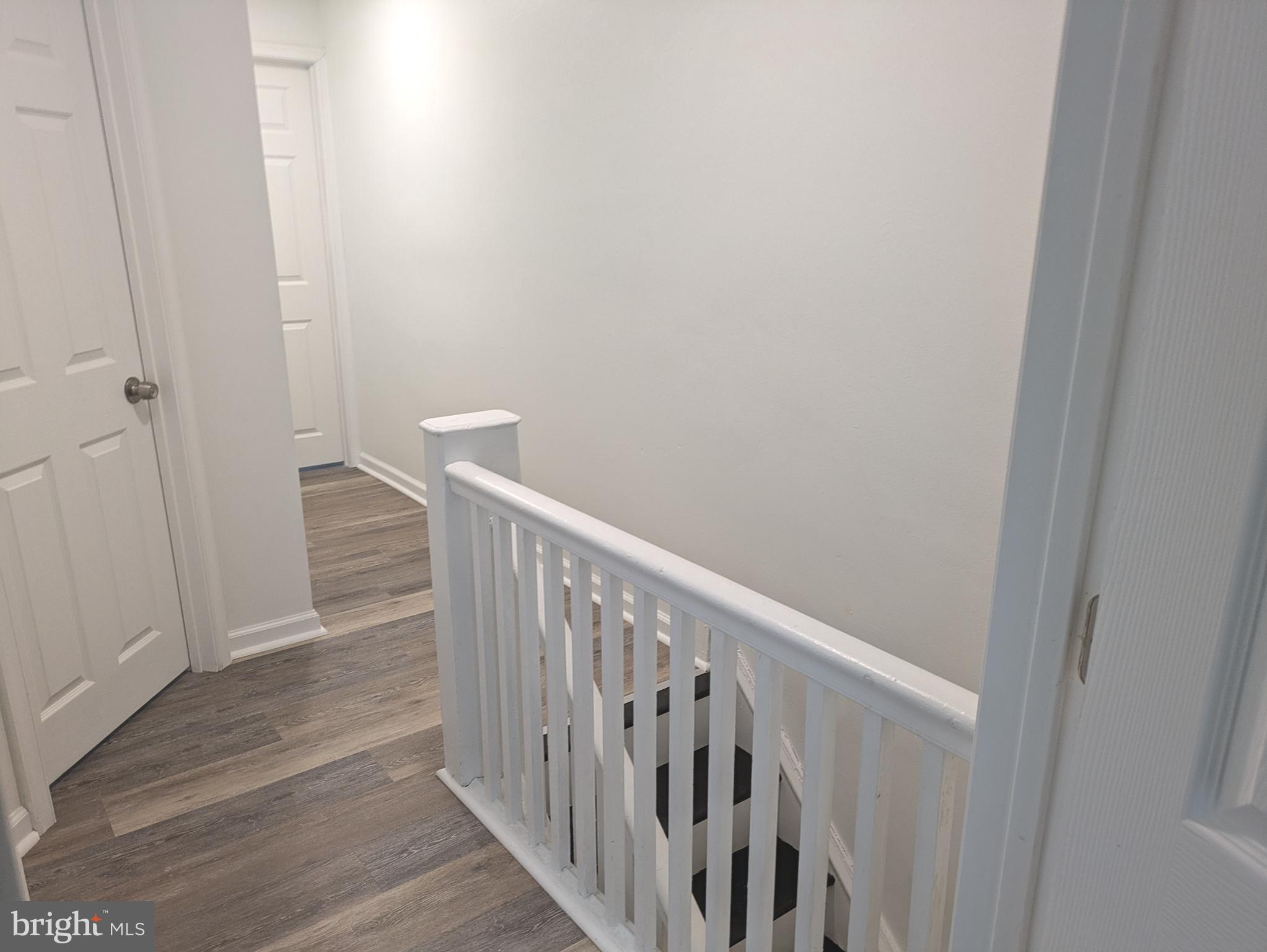 417 Copley Road Upper Darby, PA 19082 - Photo 18 of 23 a view of a hallway with wooden floor
