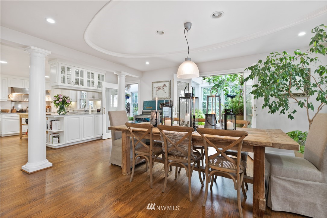 16119 73rd Place West Edmonds, WA 98026 - Photo 13 of 40 a view of a dining room with furniture window and wooden floor