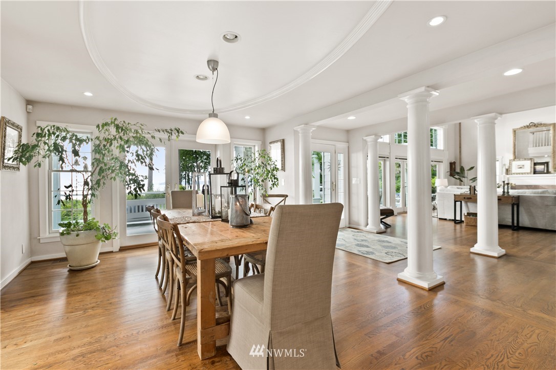 16119 73rd Place West Edmonds, WA 98026 - Photo 16 of 40 a view of a dining room with furniture window and wooden floor