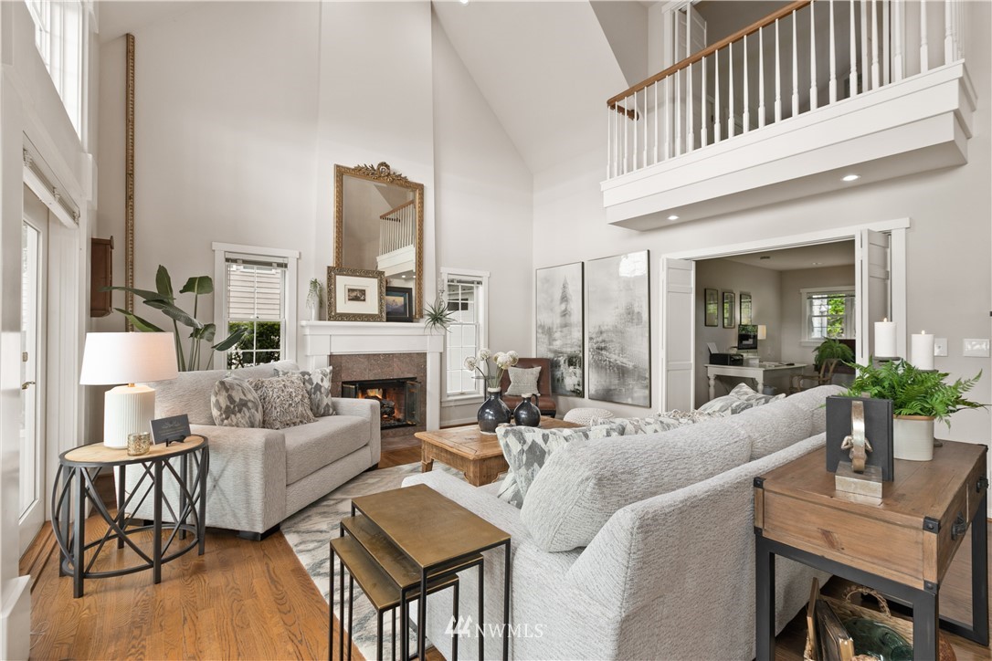 16119 73rd Place West Edmonds, WA 98026 - Photo 22 of 40 a living room with fireplace furniture and a large window