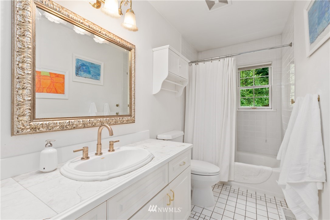 16119 73rd Place West Edmonds, WA 98026 - Photo 33 of 40 a bathroom with a sink toilet and shower