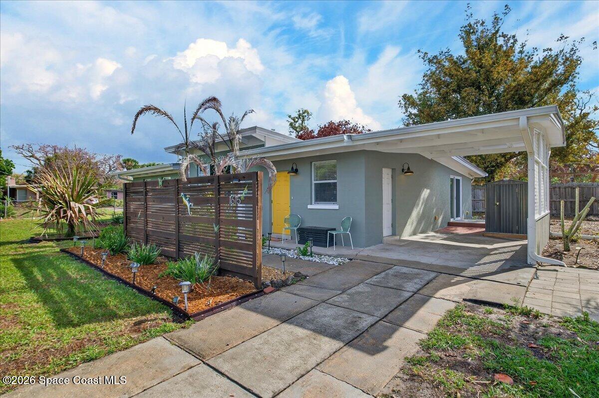 1615 Grandview Way Melbourne, FL 32935 - Photo 1 of 34 a front view of a house