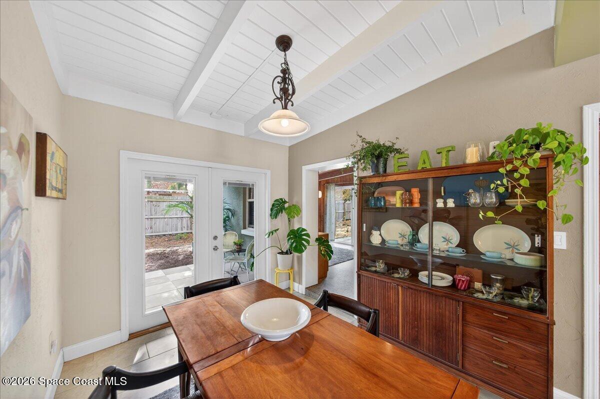1615 Grandview Way Melbourne, FL 32935 - Photo 14 of 34 a view of a dining room with furniture window and wooden floor