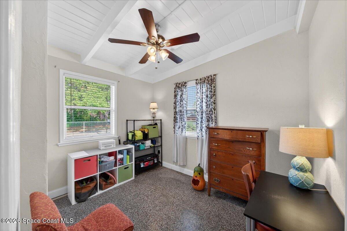 1615 Grandview Way Melbourne, FL 32935 - Photo 22 of 34 a living room with furniture and a window