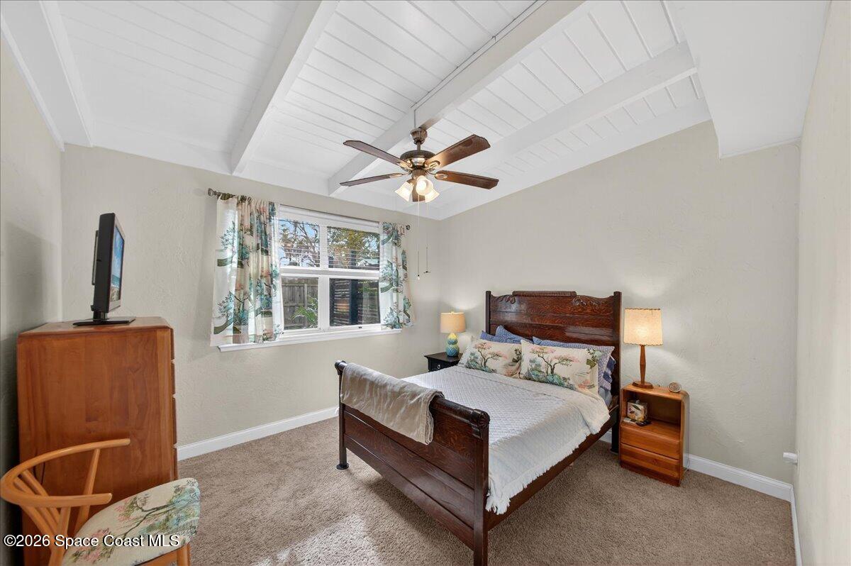 1615 Grandview Way Melbourne, FL 32935 - Photo 23 of 34 a bedroom with a bed and window