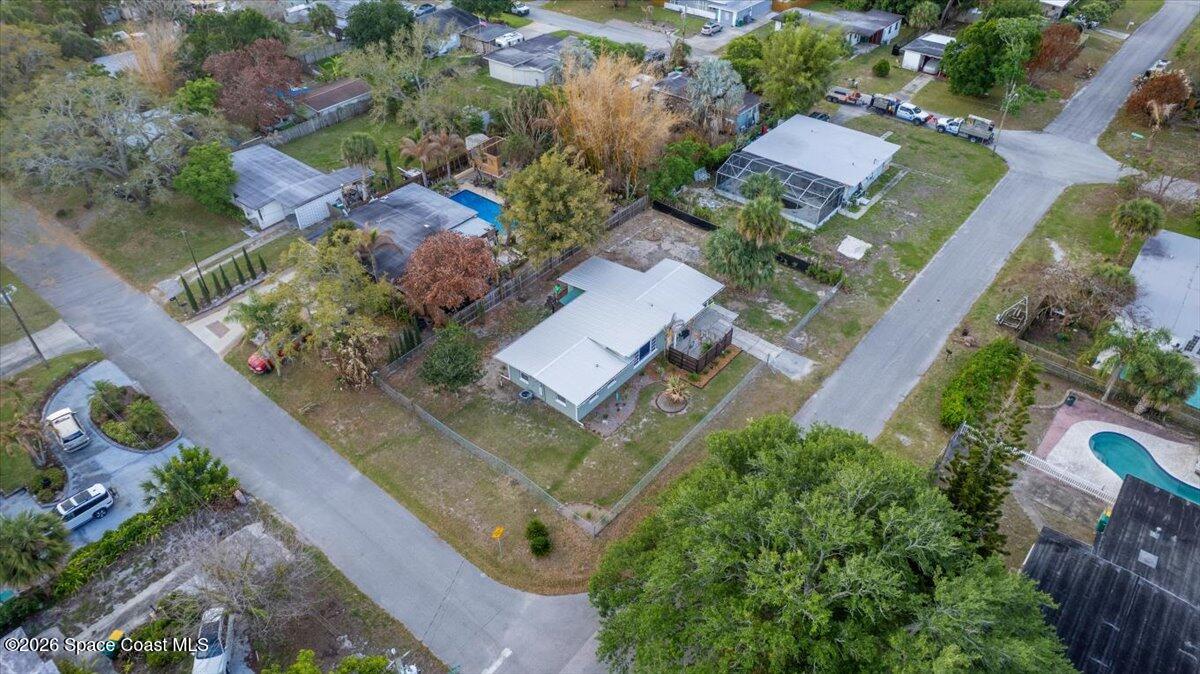 1615 Grandview Way Melbourne, FL 32935 - Photo 32 of 34 an aerial view of a house with a garden