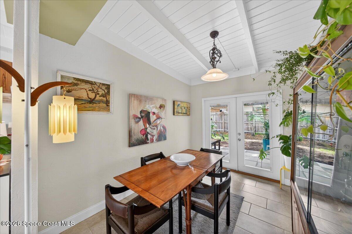 1615 Grandview Way Melbourne, FL 32935 - Photo 4 of 34 a dining room with furniture and window