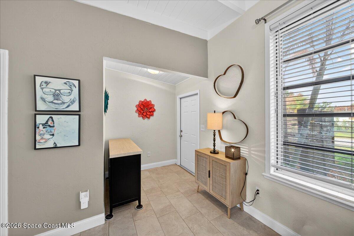 1615 Grandview Way Melbourne, FL 32935 - Photo 6 of 34 a room with furniture and window