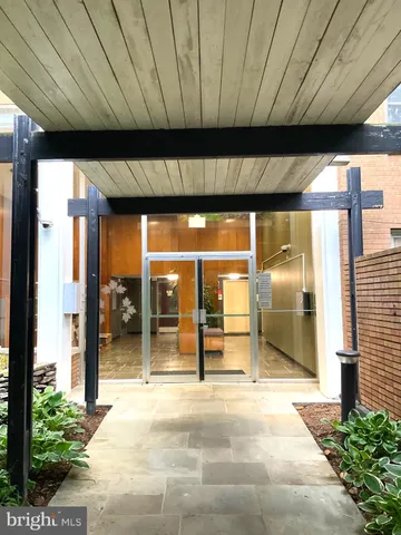 a kitchen with a sink stove and refrigerator