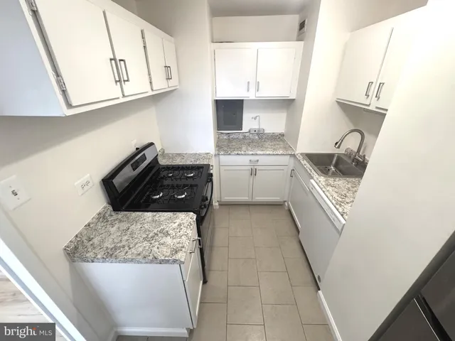 a bathroom with a tub and a shower