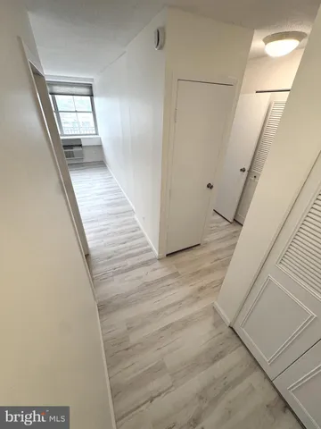 a view of wooden floor in an empty room