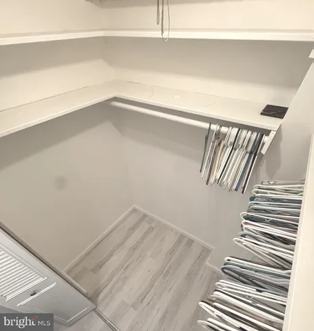 a view of an empty walk in closet