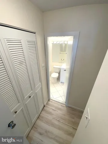 a kitchen with a sink cabinets and stainless steel appliances