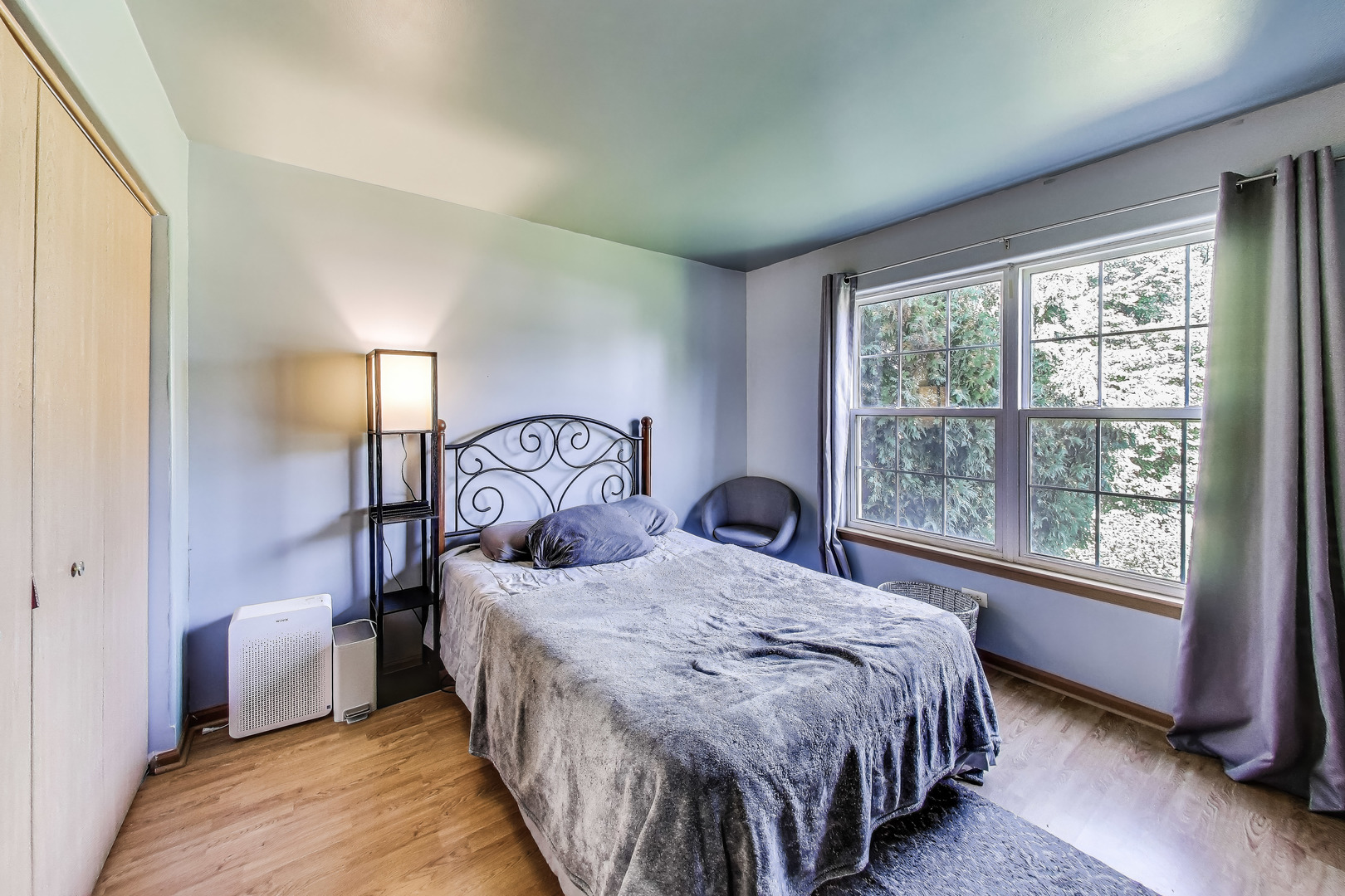 1086 Lily Field Lane Bolingbrook, IL 60440 - Photo 14 of 24 a bedroom with a large bed and a window