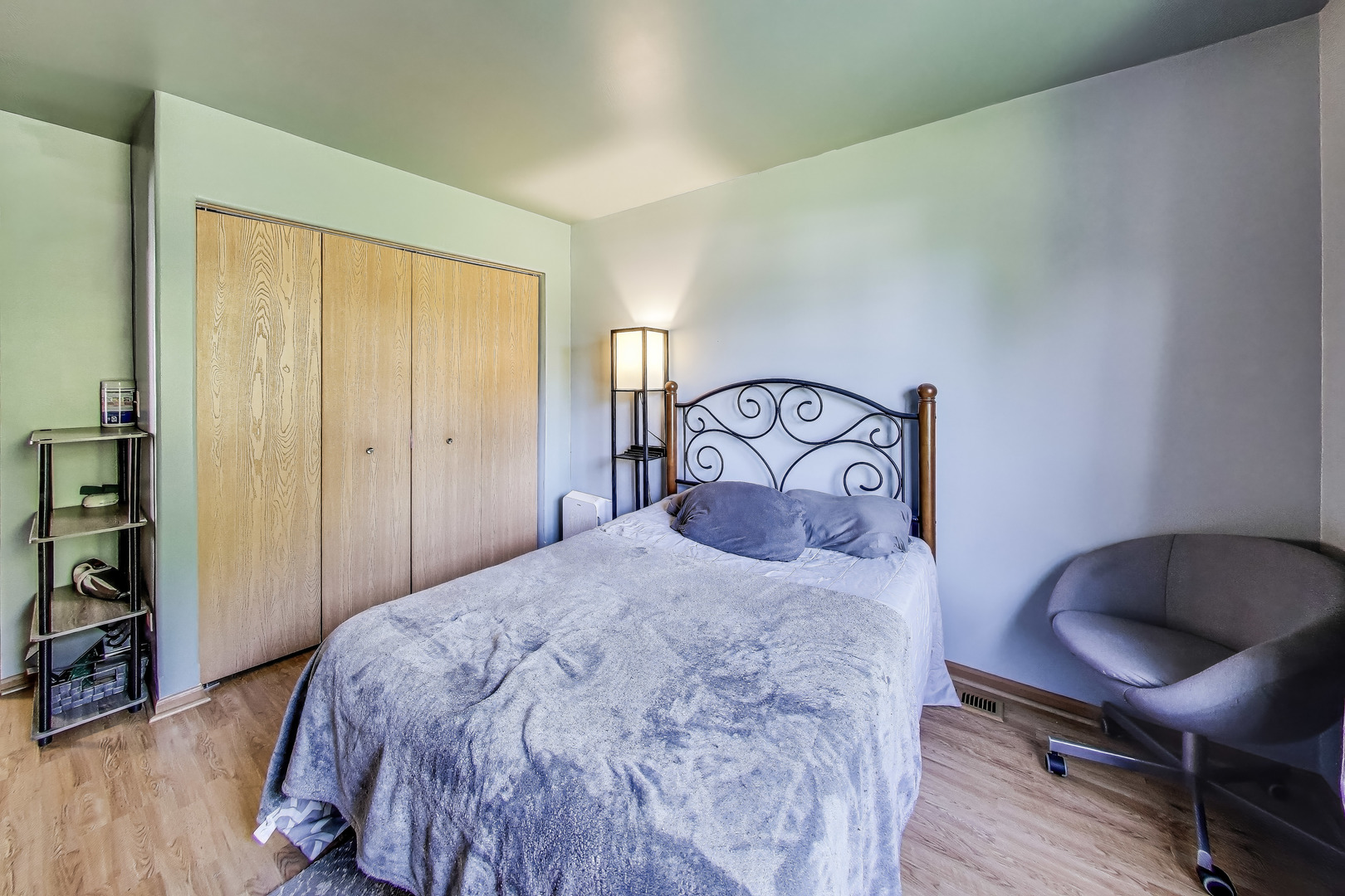 1086 Lily Field Lane Bolingbrook, IL 60440 - Photo 15 of 24 a bedroom with a bed and a chair