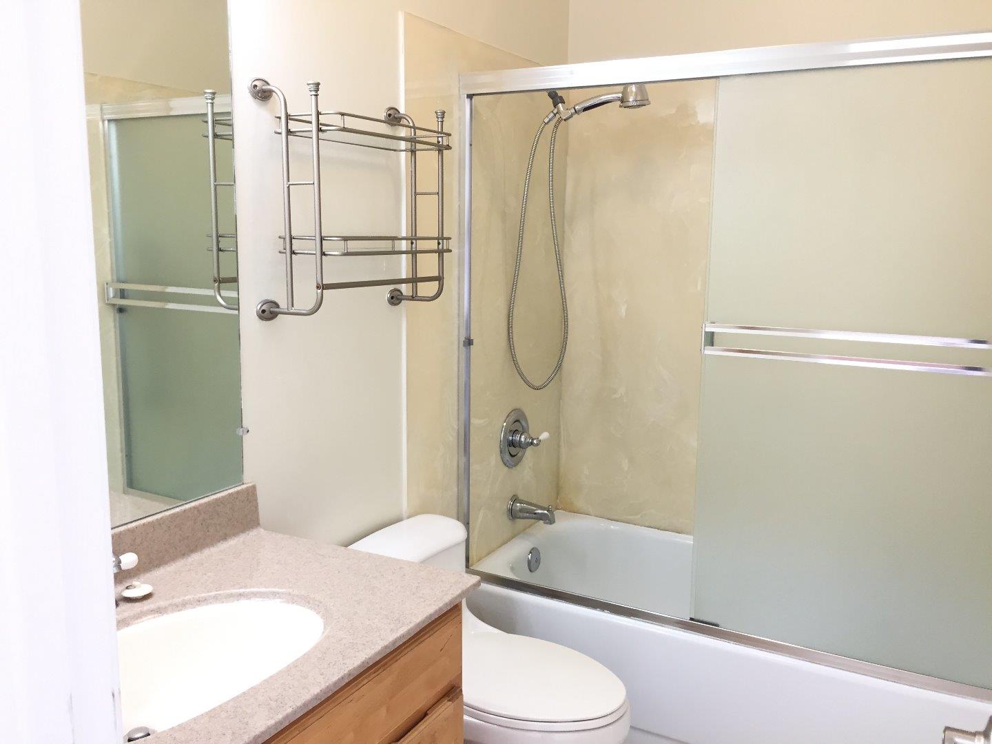 102 Marylinn Drive Milpitas, CA 95035 - Photo 11 of 18 a bathroom with a sink toilet and shower
