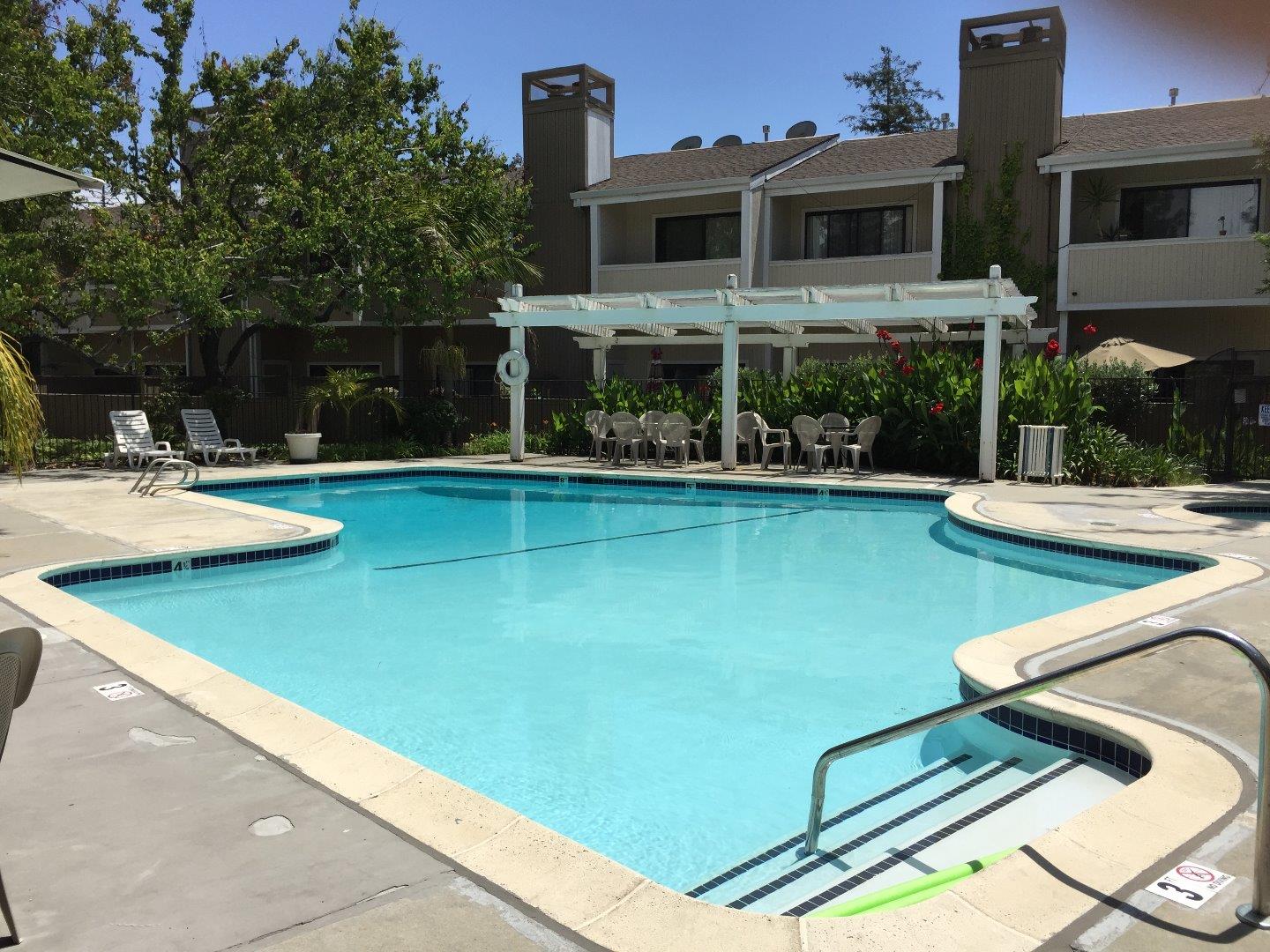 102 Marylinn Drive Milpitas, CA 95035 - Photo 15 of 18 a view of a patio with table and chairs and potted plants