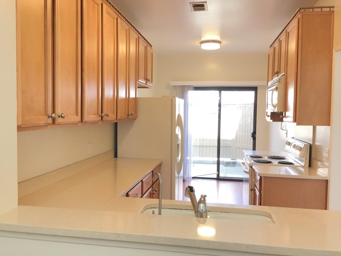 102 Marylinn Drive Milpitas, CA 95035 - Photo 6 of 18 a view of a living room with a large window