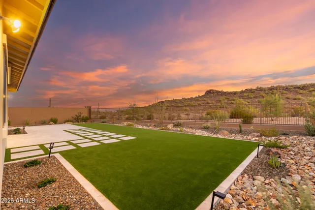 a view of a lake with mountains in the background