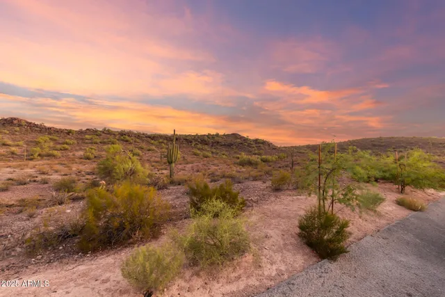 a view of a swimming pool with sitting space
