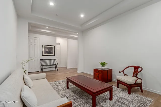 a kitchen with stainless steel appliances kitchen island granite countertop a refrigerator and a stove top oven