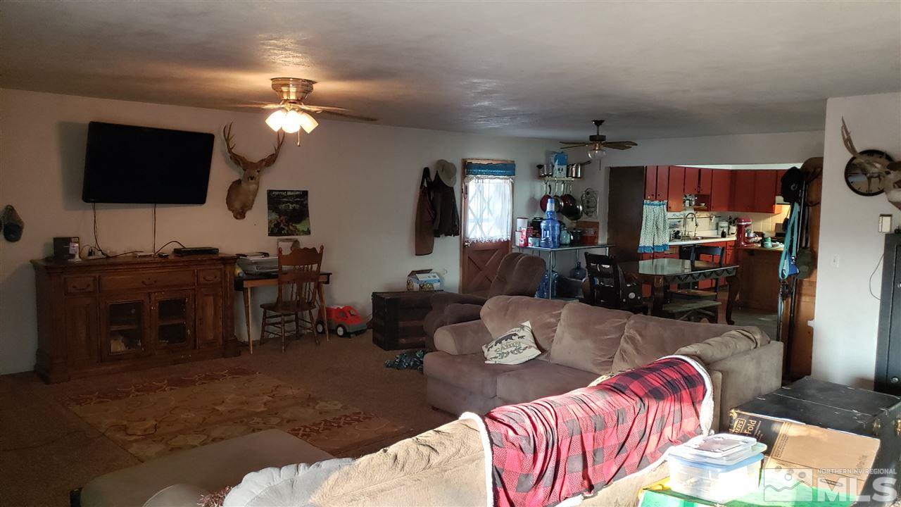 1505 Soda Lake Road Fallon, NV 89406 - Photo 15 of 31 a living room with furniture and a flat screen tv
