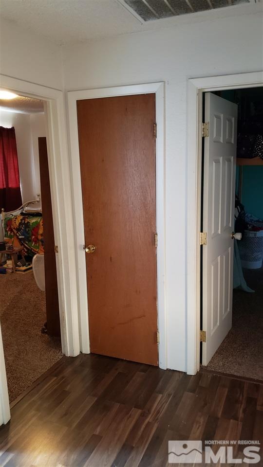 1505 Soda Lake Road Fallon, NV 89406 - Photo 25 of 31 wooden floor in an empty room
