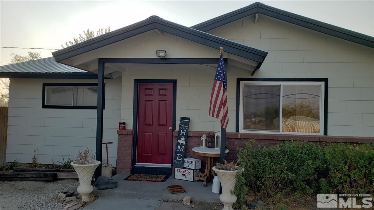 1505 Soda Lake Road Fallon, NV 89406 - Photo 3 of 31 a front view of a house with a yard