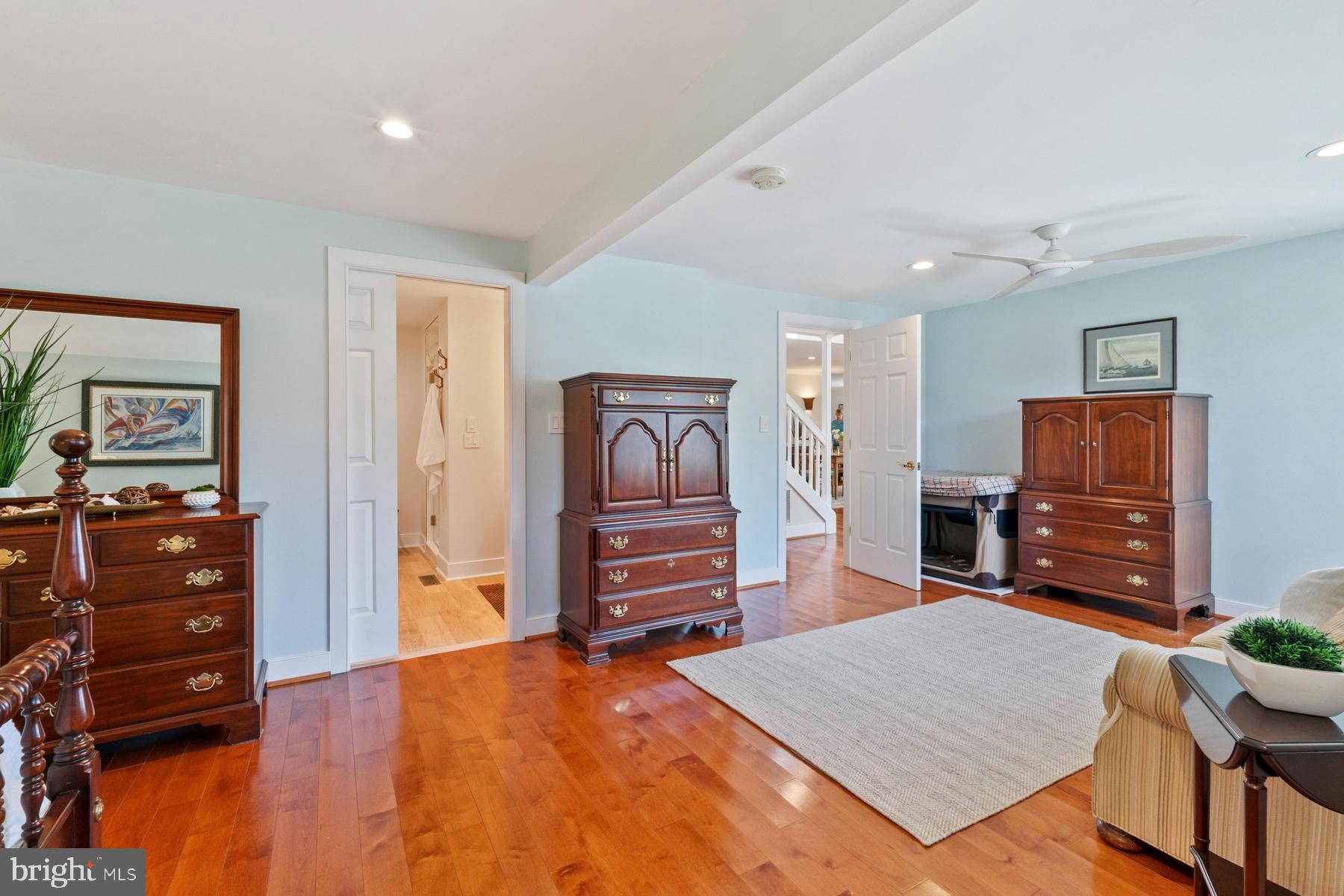 8095 Church Neck Road St. Michaels, MD 21663 - Photo 23 of 48 a bedroom with furniture and a flat screen tv
