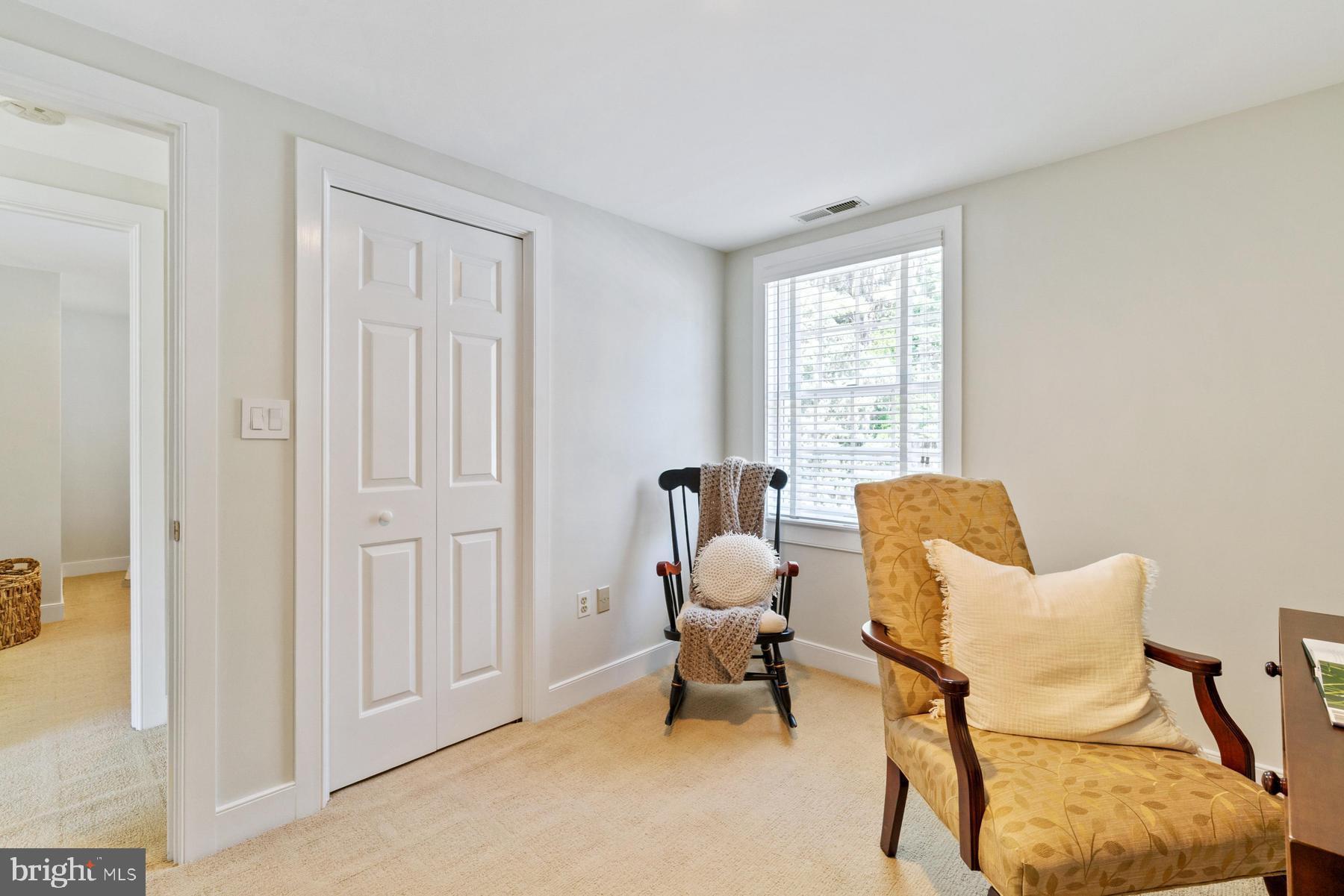 8095 Church Neck Road St. Michaels, MD 21663 - Photo 34 of 48 a living room with furniture and a window