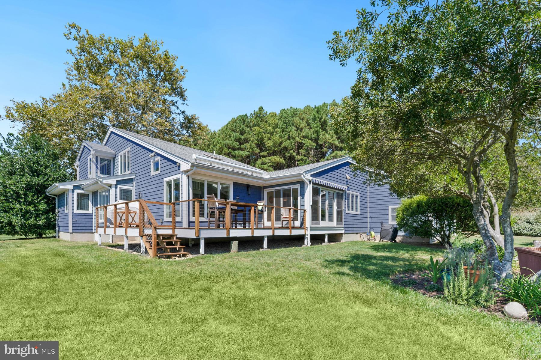 8095 Church Neck Road St. Michaels, MD 21663 - Photo 39 of 48 front view of a house with a yard