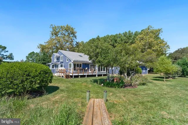 a aerial view of a house with garden