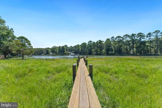 a view of a lake with a big yard