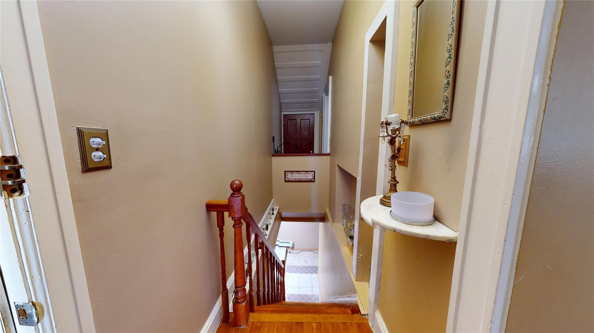 31-06 Healy Avenue Queens, NY 11691 - Photo 21 of 34 Stairs with wood finished floors and baseboards
