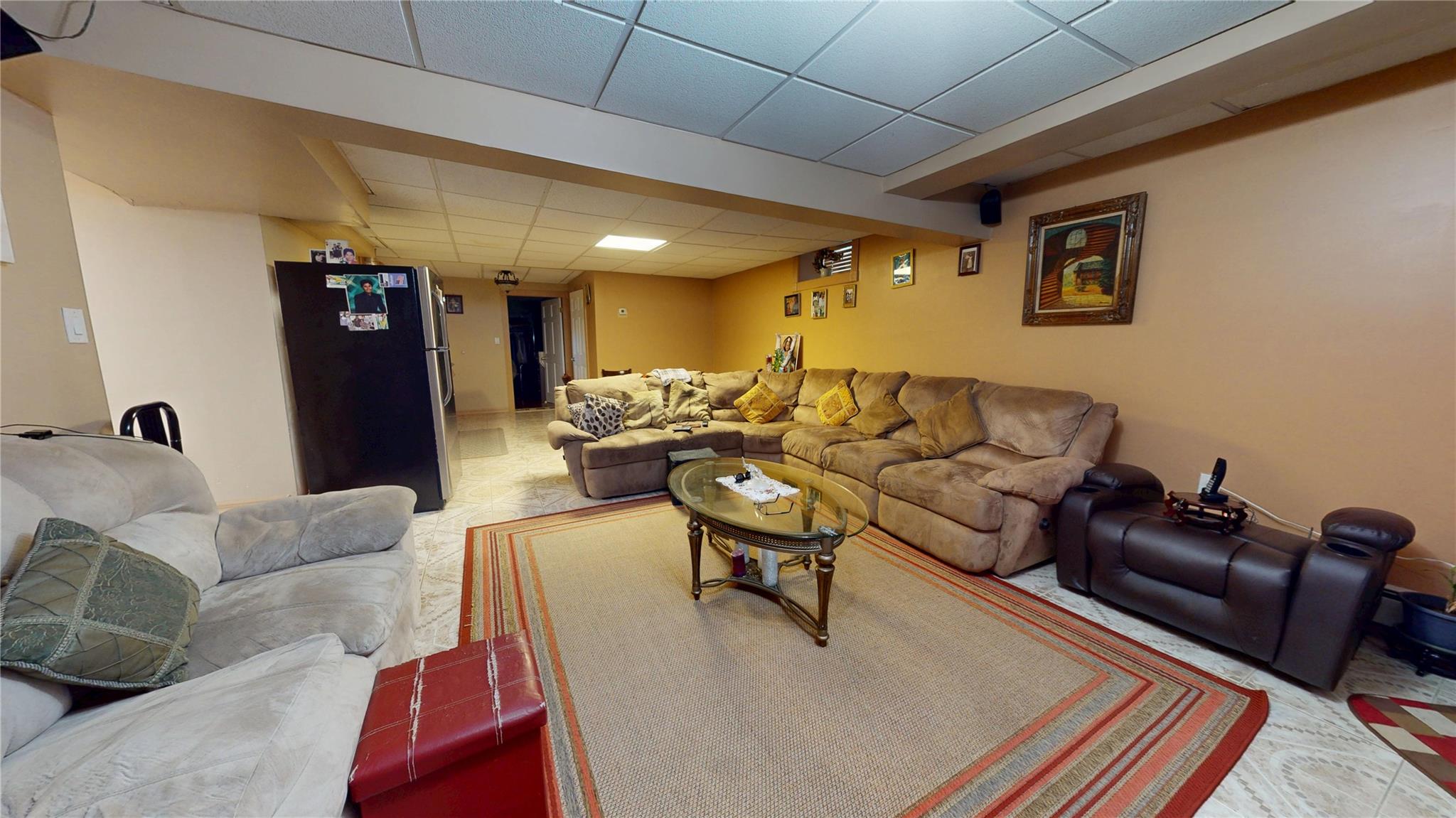 31-06 Healy Avenue Queens, NY 11691 - Photo 32 of 34 Living area with a paneled ceiling