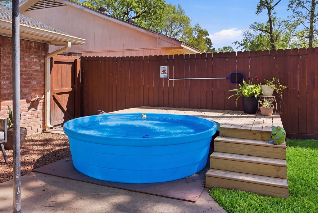 3443 Gary Lane Spring, TX 77380 - Photo 30 of 37 Off to the left you have a "plunge" pool and deck area.