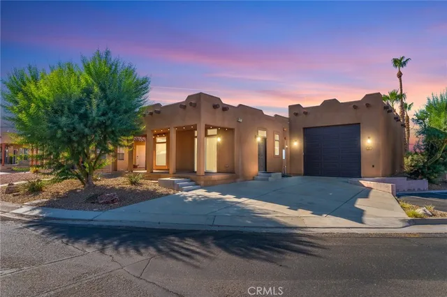 a view of a house with a patio