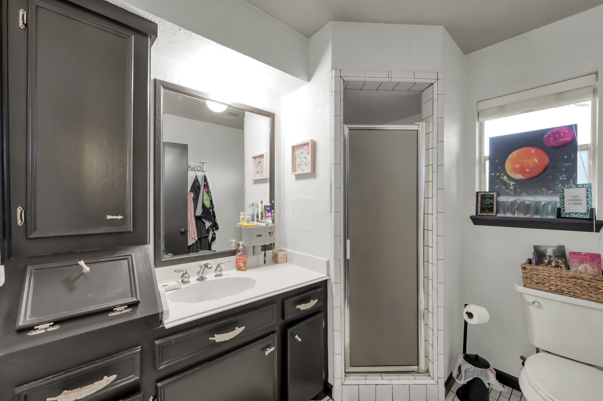 25610 Walnut Grove Circle Spring, TX 77380 - Photo 19 of 29 a bathroom with a sink and a mirror
