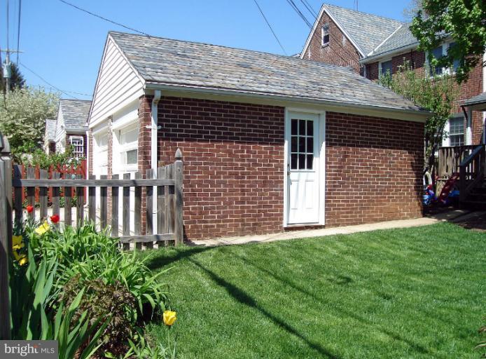 331 Murdock Road Baltimore, MD 21212 - Photo 14 of 19 a front view of a house with garden