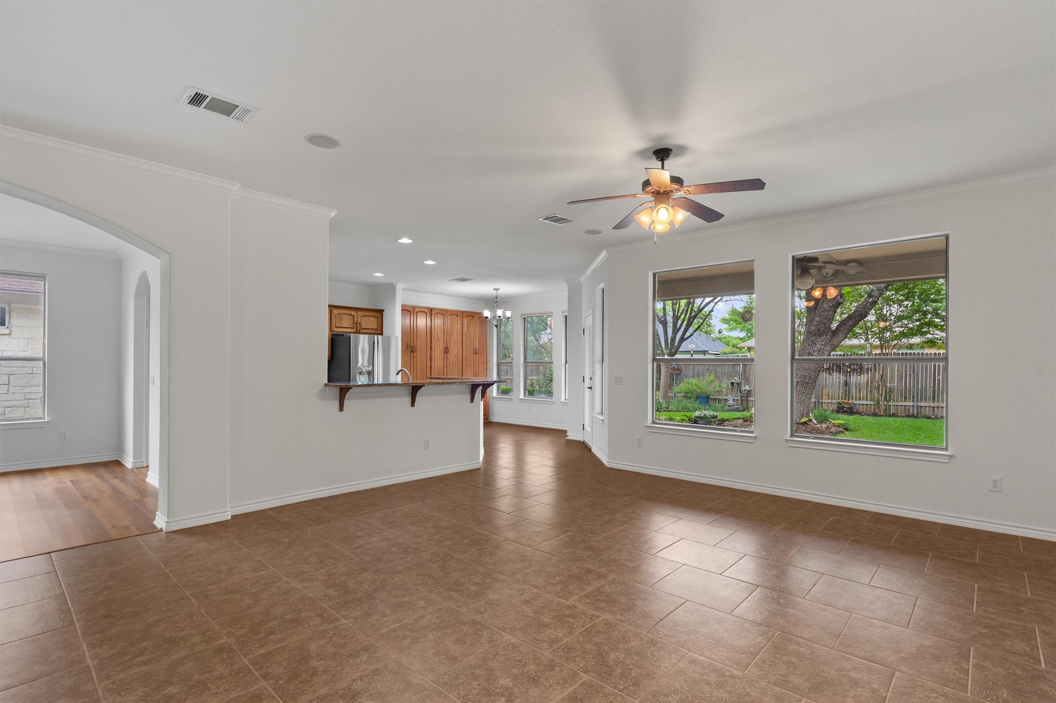 4612 Sonora Trace Georgetown, TX 78633 - Photo 17 of 36 wooden floor in an empty room with a window