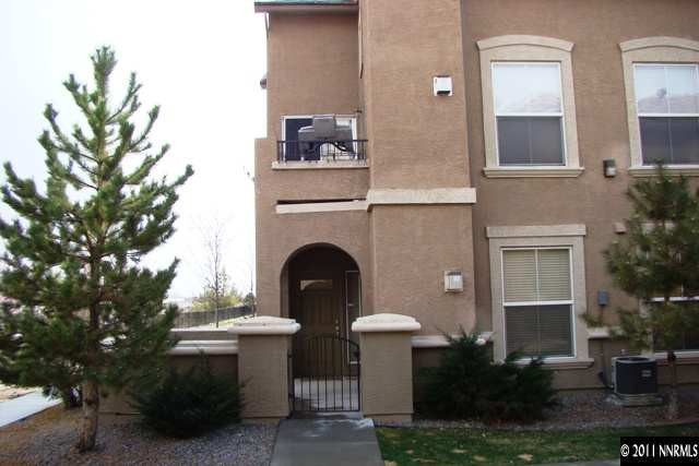 9050 Double R Boulevard, Unit 711 Reno, NV 89521 - Photo 1 of 13 a view of house and outdoor space