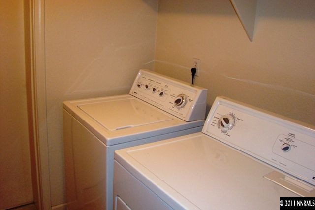 9050 Double R Boulevard, Unit 711 Reno, NV 89521 - Photo 12 of 13 a utility room with dryer and washer