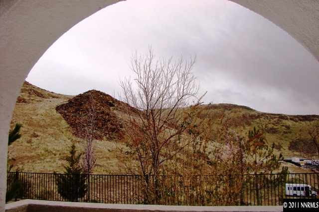 9050 Double R Boulevard, Unit 711 Reno, NV 89521 - Photo 13 of 13 a view of mountain view with mountains in the background