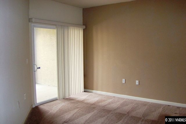9050 Double R Boulevard, Unit 711 Reno, NV 89521 - Photo 10 of 13 a view of a livingroom with a staircase