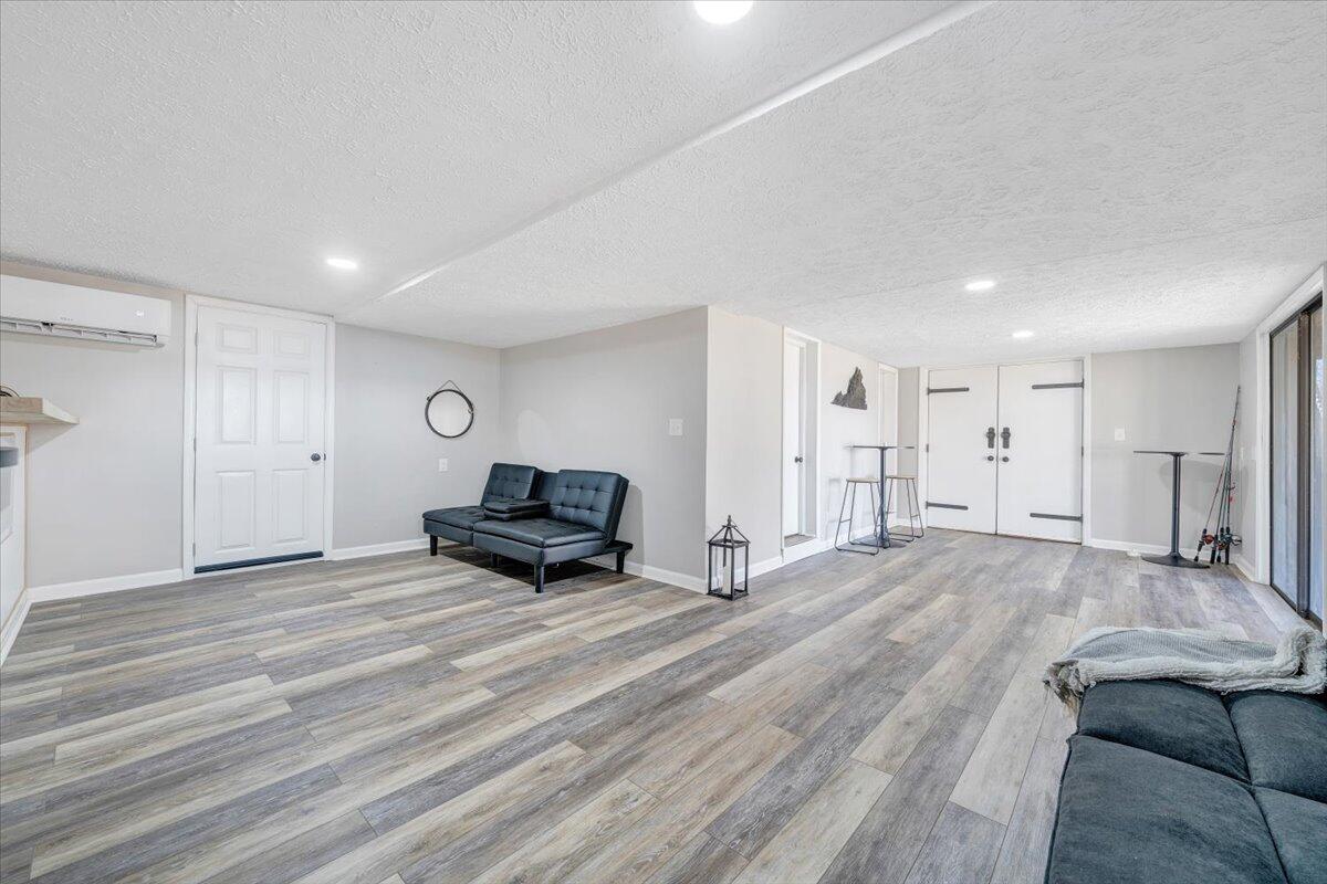 1111 Jefferson Dock Road Penhook, VA 24137 - Photo 29 of 50 a view of empty room with wooden floor