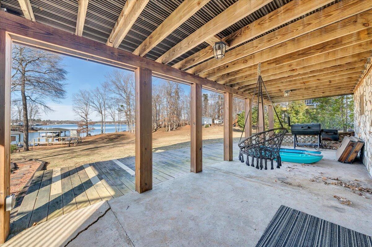 1111 Jefferson Dock Road Penhook, VA 24137 - Photo 37 of 50 a view of a porch with furniture and a porch