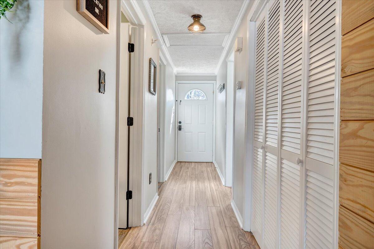 1111 Jefferson Dock Road Penhook, VA 24137 - Photo 8 of 50 a view of a hallway with wooden floor