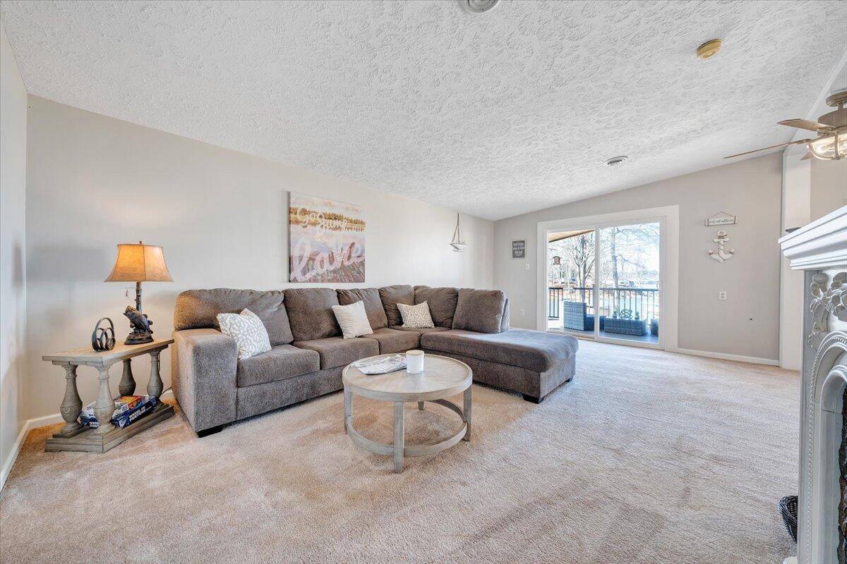 1111 Jefferson Dock Road Penhook, VA 24137 - Photo 10 of 50 a living room with furniture and a window